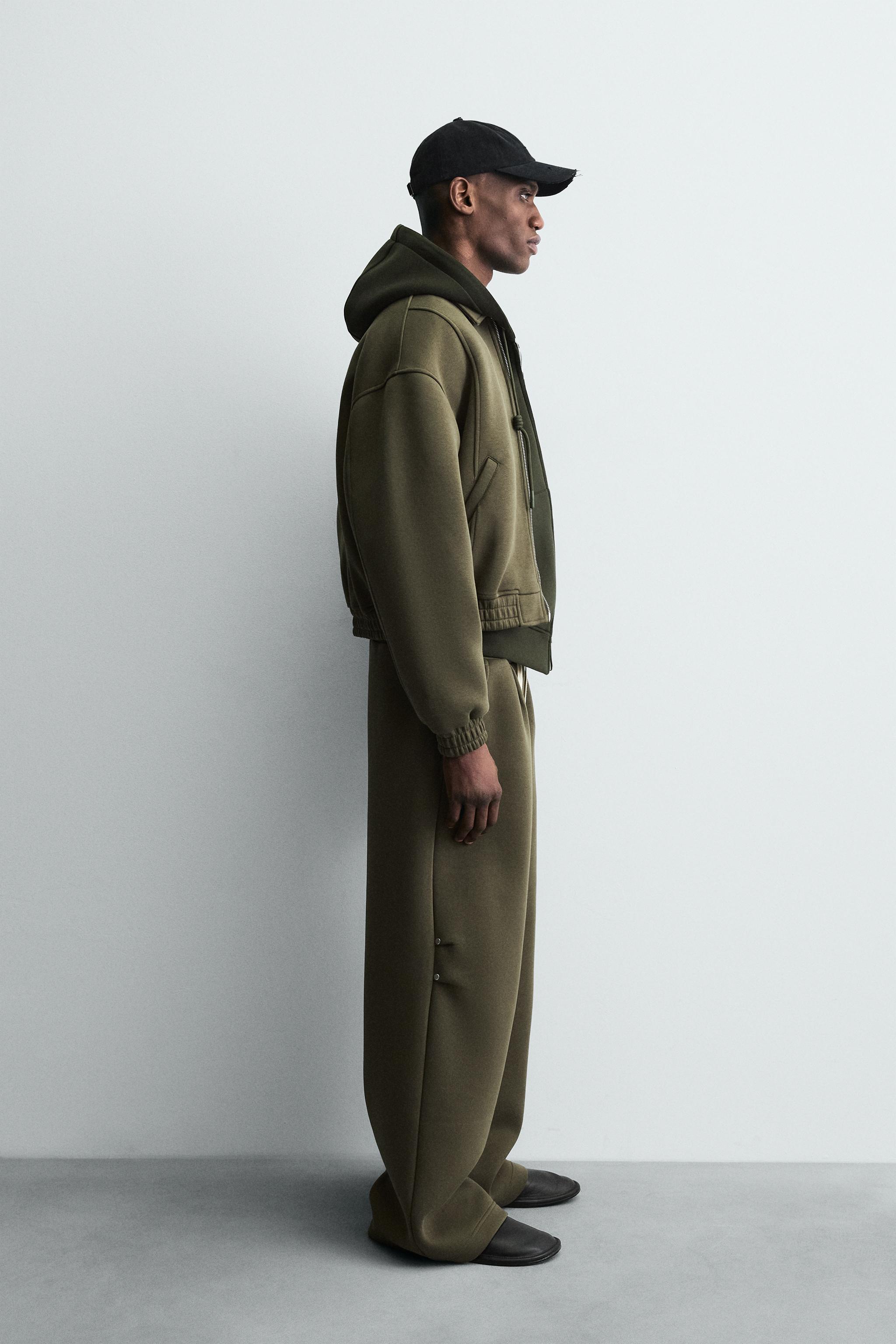 WIDE FIT NEOPRENE EFFECT PANTS WITH STUDS